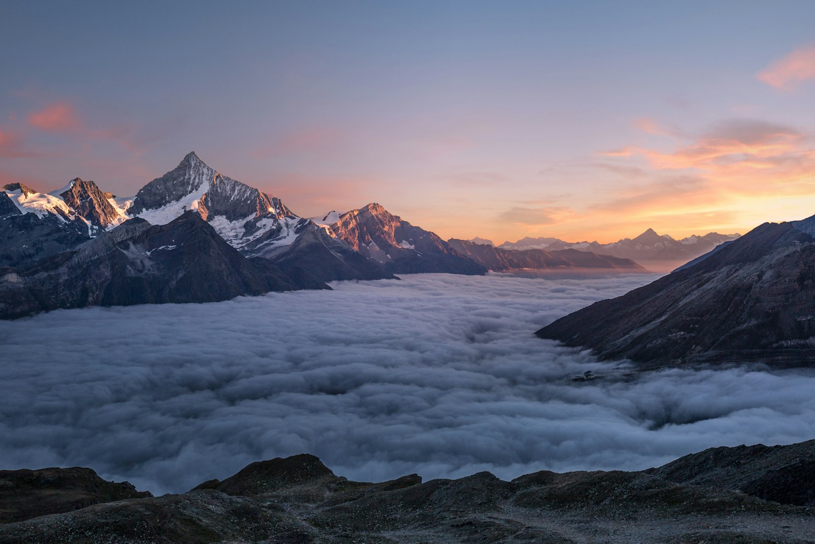 Dramatic mountain peaks with clouds